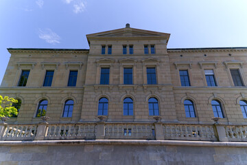 Government building at quayside of Swiss City of Zug on a sunny spring day. Photo taken May 22nd, 2023, Zug, Switzerland.