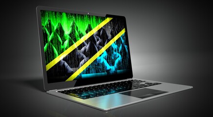 Tanzania - country flag and hackers on laptop screen - cyber attack concept