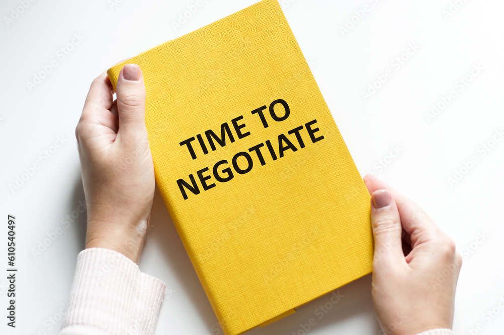 Poster man holding a yellow notepad with text time to negotiate