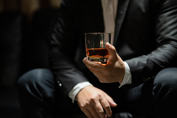  Barman pouring whiskey whiskey glass celebrate whiskey on a friendly party in  restaurant