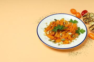 Concept of tasty homemade dish - baked pumpkin