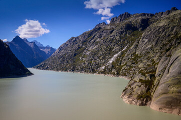 Grimsel reservoir lake with surrounding mountains, Grimselpass, Switzerland.