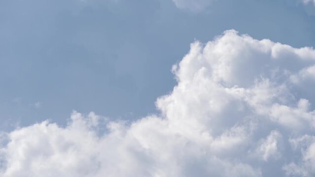 Fast speed scene of white fluffy cloud changing shape on gray cloudy sky, abstract beautiful cloudscape environment on rainy season, time lapse flowing air