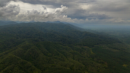 Mountain landscape with mountain peaks covered with forest. Sumatra, Indonesia.