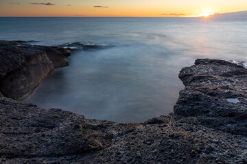 Sonnenuntergang an der Küste von Playa Puertito bei Costa Adeje, Teneriffa