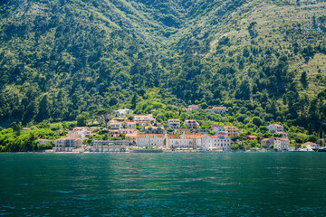 Fototapeta premium Small village on the shore of Boka Kotor bay in Montenegro