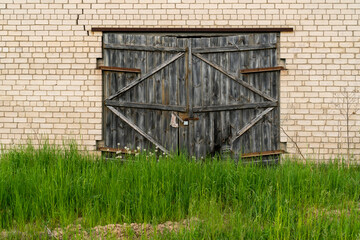 Old weathered wooden garage door