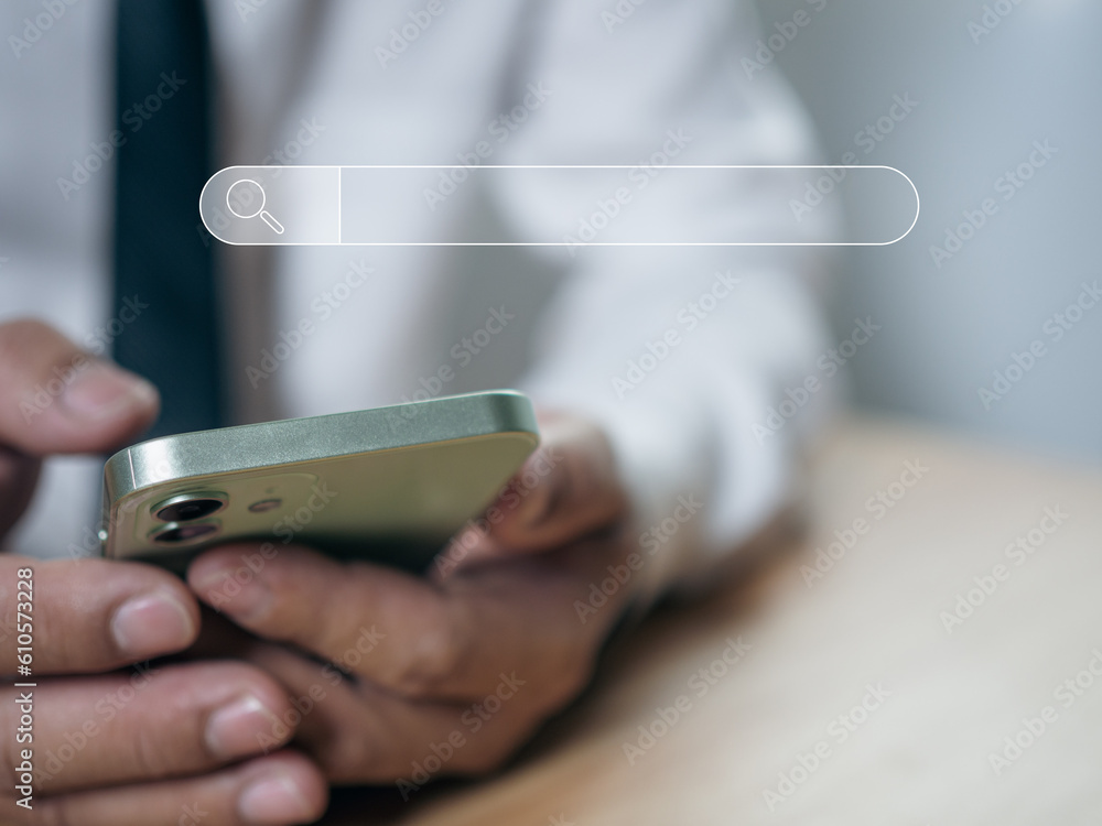Poster the concept of searching for information from the phone's network. a phone placed on the lid of the 