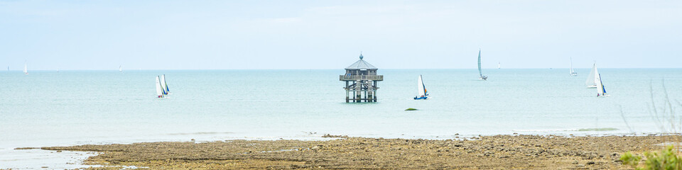The Phare du Bout du Monde, a wooden lighthouse at the Pointe des Minimes in La Rochelle, France