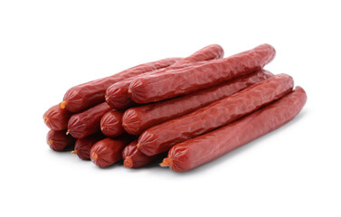 Many delicious smoked sausages isolated on white