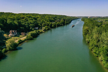 aerial view on the Seine with a barge in Seine et Marne