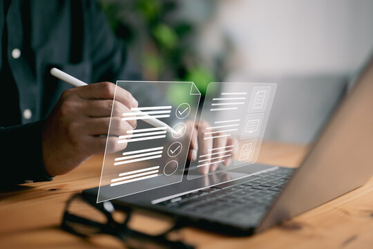 The businessman uses a laptop with electronic document icons, emphasizing e-document management, online documentation databases, and the concept of a paperless office.