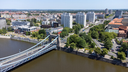 Aerial view, general cityscape of Wroclaw city, Poland. Historical Grunwaldzki bridge, landmark of Wroclaw.