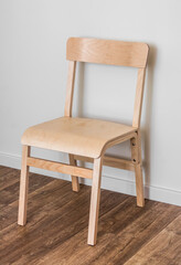 Wooden chair with a back in a minimalist style