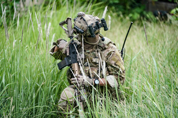 Infantry soldier shooting during military combat training.. Army elite troops marksman, special...