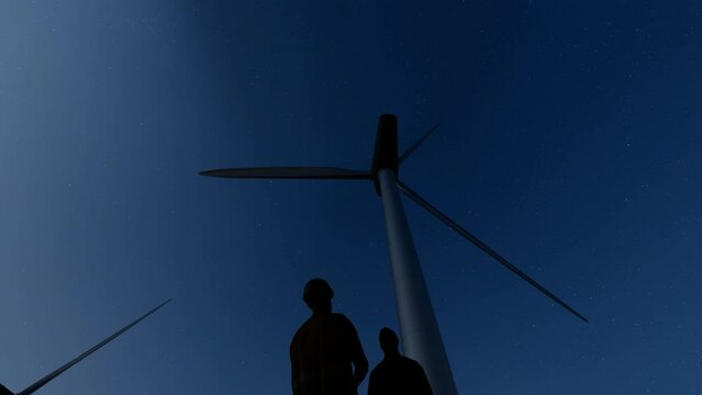 Wind turbine and maintenance workers at night, low angle view, 4K
