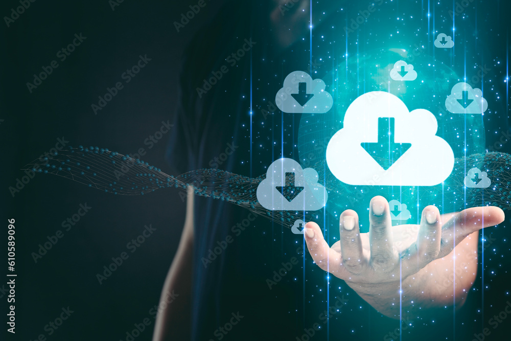 Wall mural big data download from cloud computing concept. man holding global cloud hologram to download busine