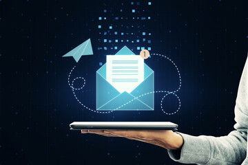 Mail application, email and communication concept with paper list in envelope with red notification alert symbol above man hand palm with digital tablet on abstract dark background