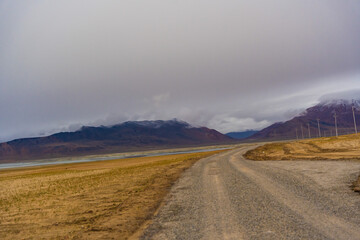  the road, mountain and cloud sky at Tanglang La pass in Ladakh, India, is the second highest motorable road in the world at 5400m