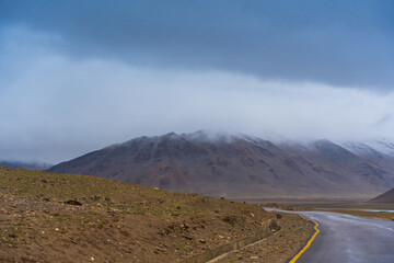 clouds covered mountains, cloudy sky, landscape at Spangnak Ri near Moriri lake, Ladakh, India