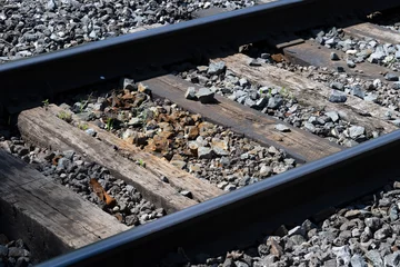 Tuinposter A damaged train track © Richard Nantais