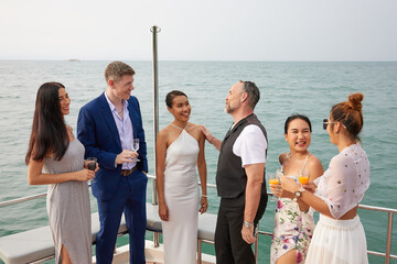 group of friends having fun and party celebrating on luxury yacht