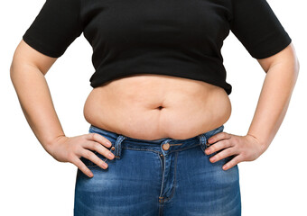 Women in jeans hand holding excessive belly fat