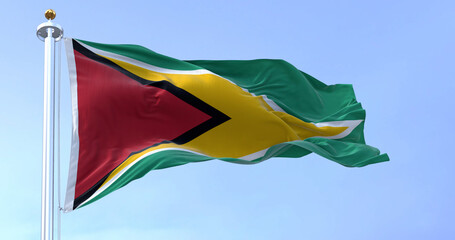 Close-up view of the Guyana national flag waving in the wind