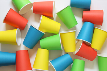 Many colorful recycling  paper cups, colorful theme for party background.