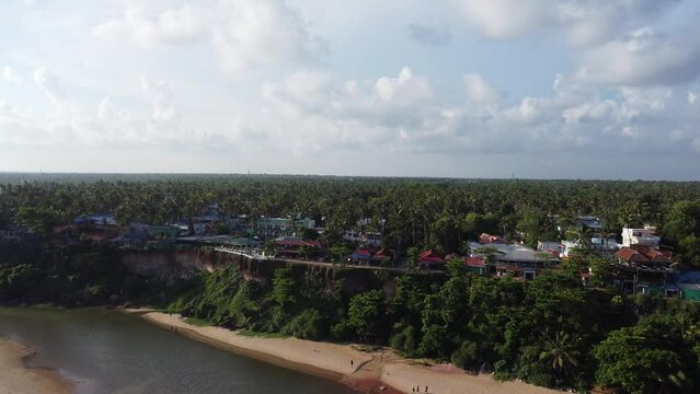 South cliff of Varkala coast kerala india during evening with beautiful cliff side hotels and caffes