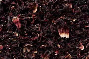 Dried hibiscus leaves close-up, hibiscus tea, background