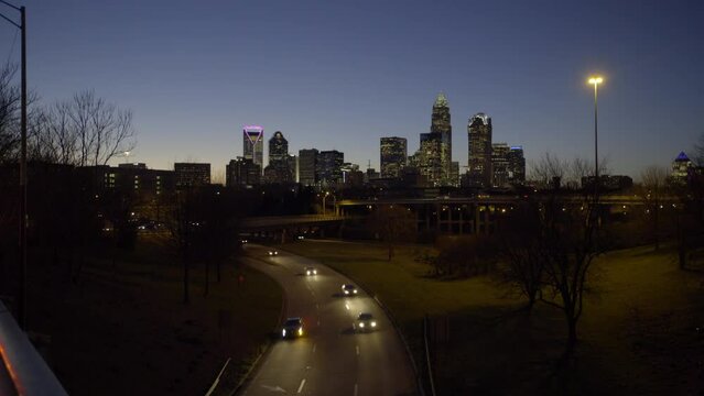 Lockdown Shot Of Vehicles On Road And Bridge In Illuminated City At Night - Charlotte, North Carolina