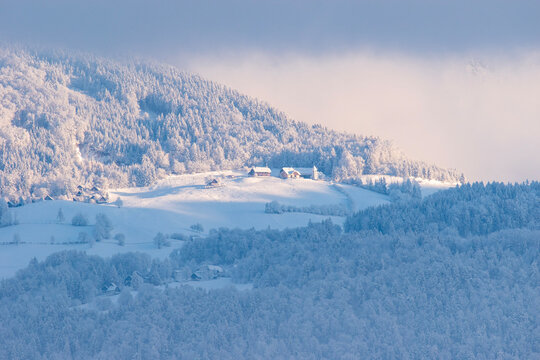 Snowy village bellow Krvavec in Slovenia