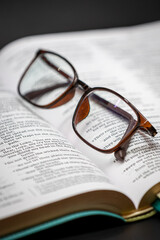 glasses on book