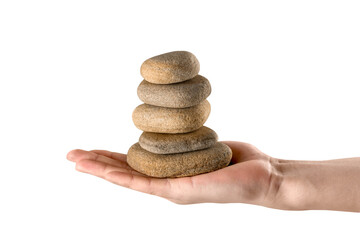 Hand holds zen stone. Balance concept
