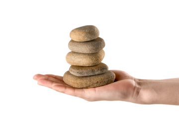 Hand holds zen stone. Balance concept