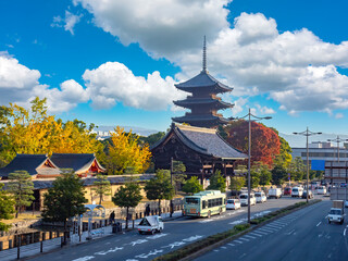 Obraz premium State of Japan. City of Kyoto. Road near ancient temple. Kyoto in sunny weather. Japanese architecture. Pagoda in Japanese province. Autumn in Japan. Holidays in Kyoto. Japan view from quadcopter