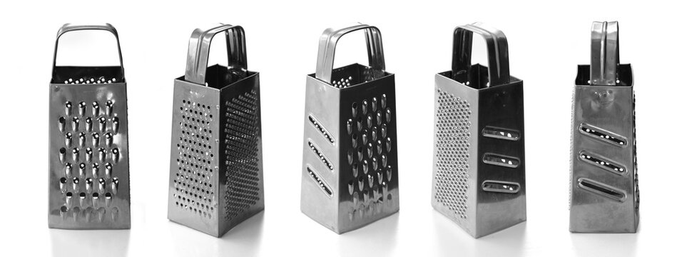 Metal Grater box set isolated on white background. shiny metal new grater isolated on white background, close-up food stainless grater