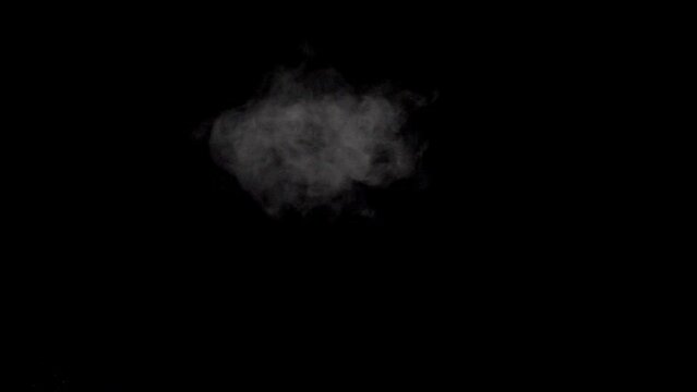 White Smoke,steam On A Black Background.  Top-Down Angle. Slow Motion. Shot In 4K Resolution At 120fps.