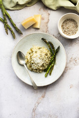 Risotto with green asparagus and cheese. Delicious, simple and tasty dish.