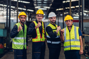 Workers Factory or Engineering work at factory site check up machine or products in site. Foreman or Technician checking Material or Machine on Plant. Heavy industry factory concept.