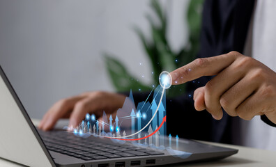 Businessman analyzing sales growth data graph on modern interface icons analysis of business planning and development digital marketing.