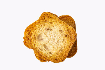 square pieces of dry white bread on a white background, top view