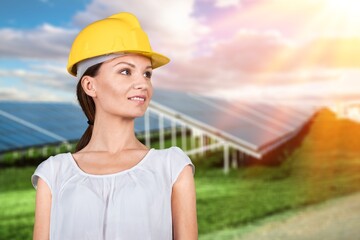 Professional engineer with solar panels background