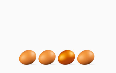 Three fresh brown chicken eggs lie next to one golden egg on a white background with empty copy space