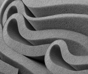 rolled gray foam sponge. foam sponge rubber texture sheet. irregular folds of material