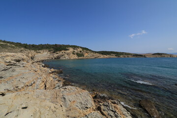 Stolac naturist stony beach on the island of Rab in Croatia