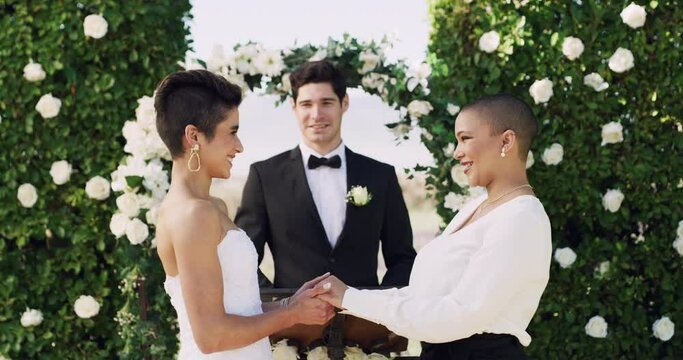 Wedding, lesbian and lgbt bride in ceremony, celebration and women together at the altar with officiant for commitment. Marriage, event and lgbtq love, pride and couple, celebrate and happiness