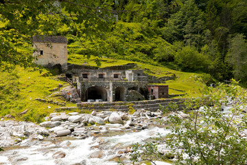Ancient building of the Craveggia Thermal Baths, public and free. On the border between Italy and...