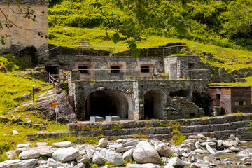 Ancient building of the Craveggia Thermal Baths, public and free. On the border between Italy and...
